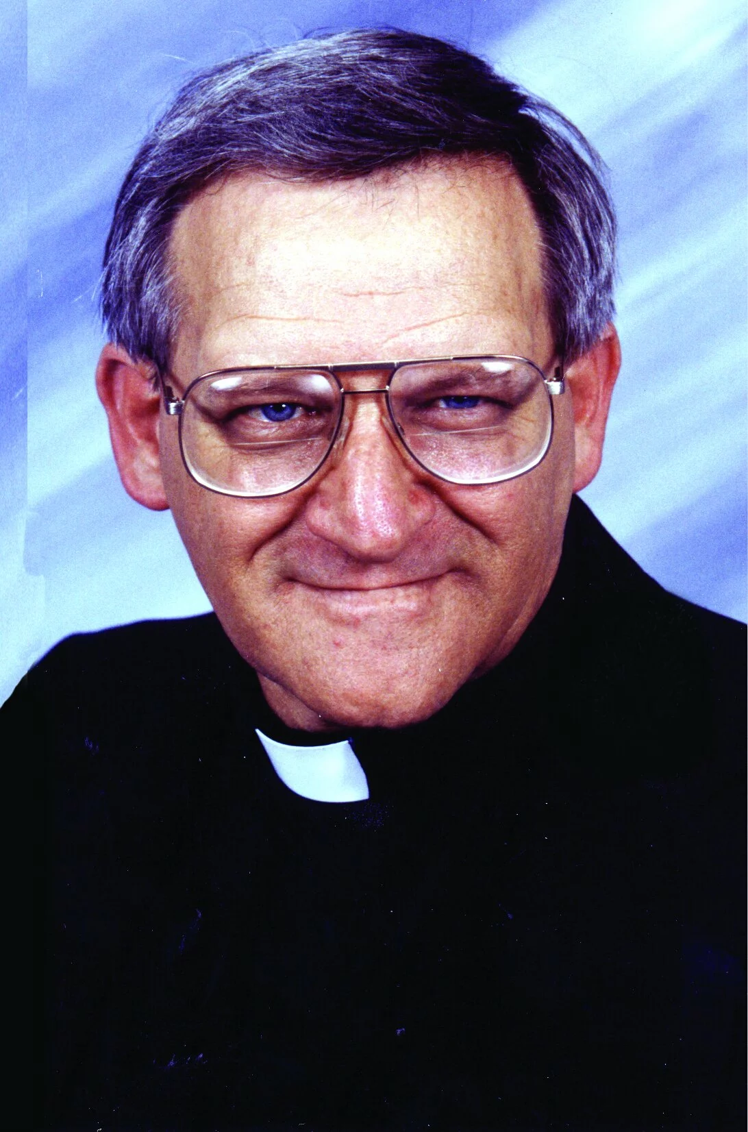 Rev. Malcolm Neyland, MCL, JCL